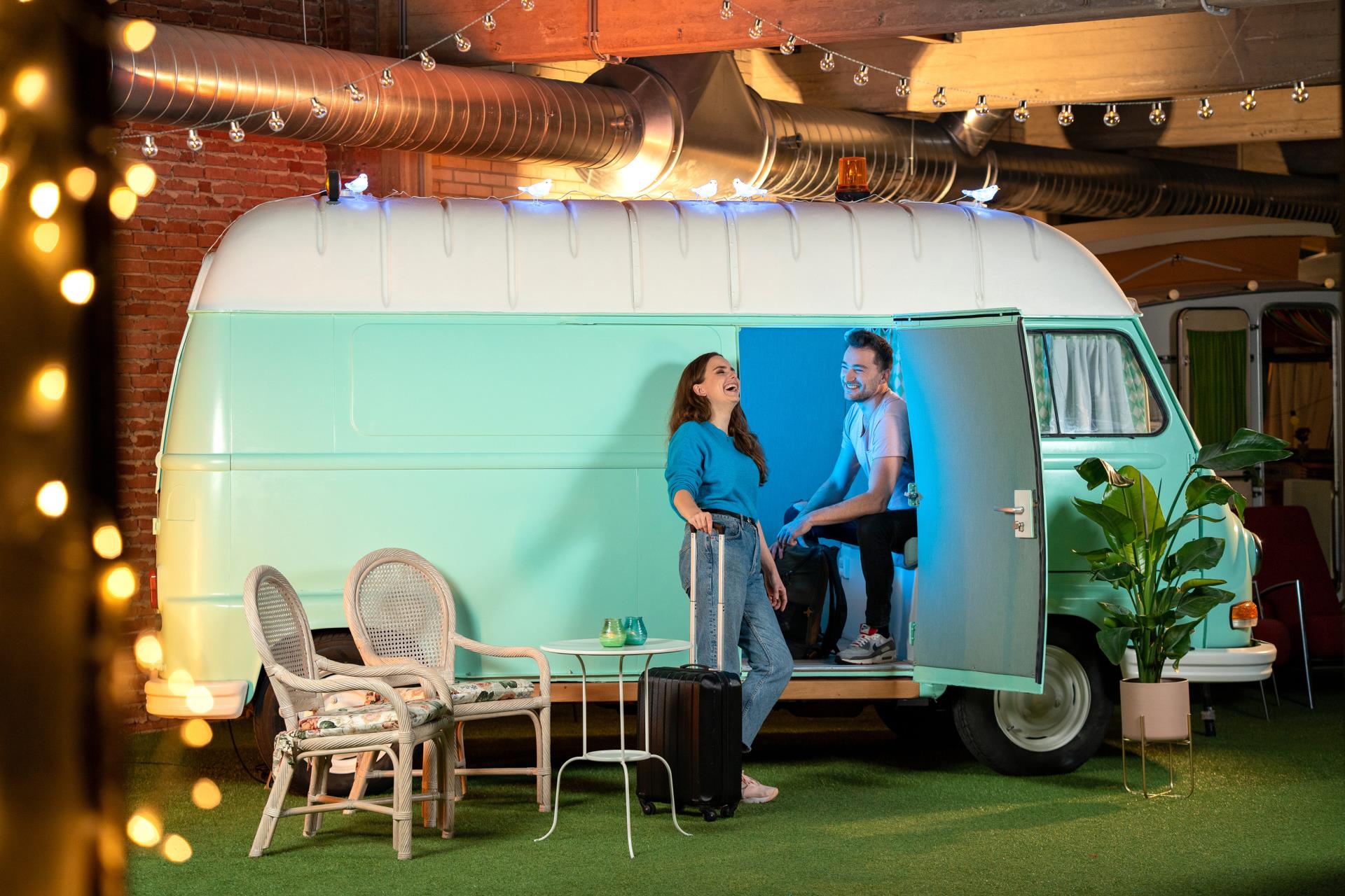 Couple having fun Camper bus Outside Inn Amsterdam indoor camping
